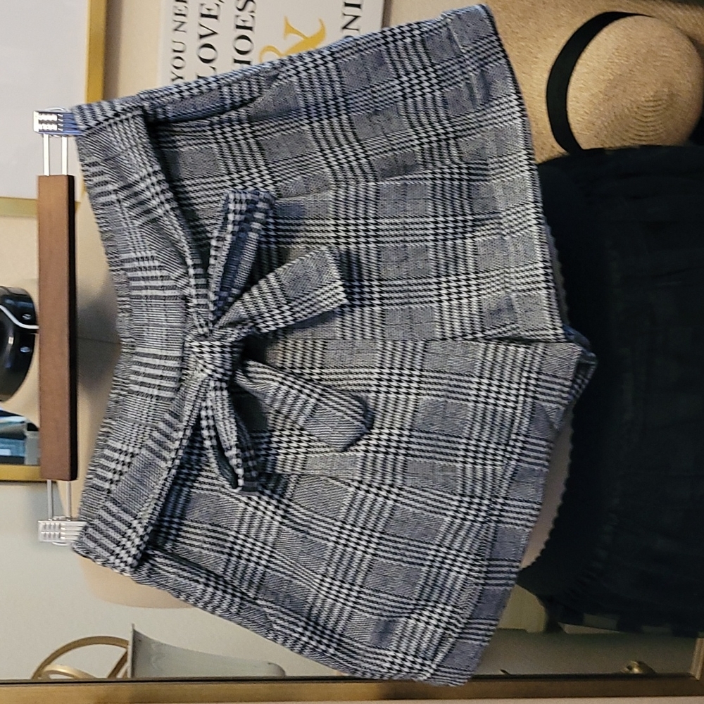 Dressy cuffed shorts with bow.